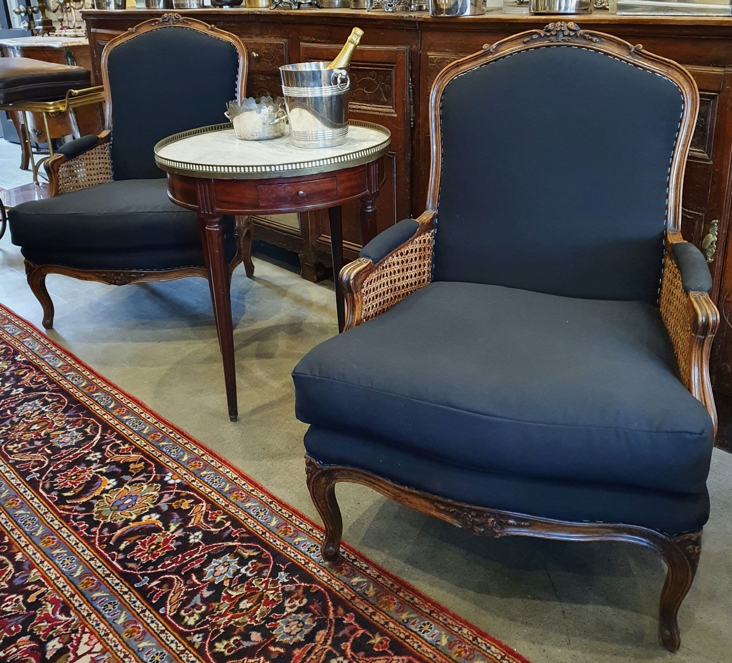 A large pair of French Louis XV Armchairs